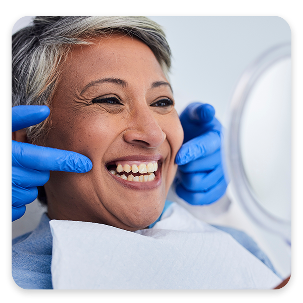 Woman smiling at the dentist's office